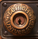 Photo of door knob with Lehigh University embossed on it